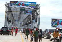 First Niger Bridge Reopens with Tinubu Posters Displayed
